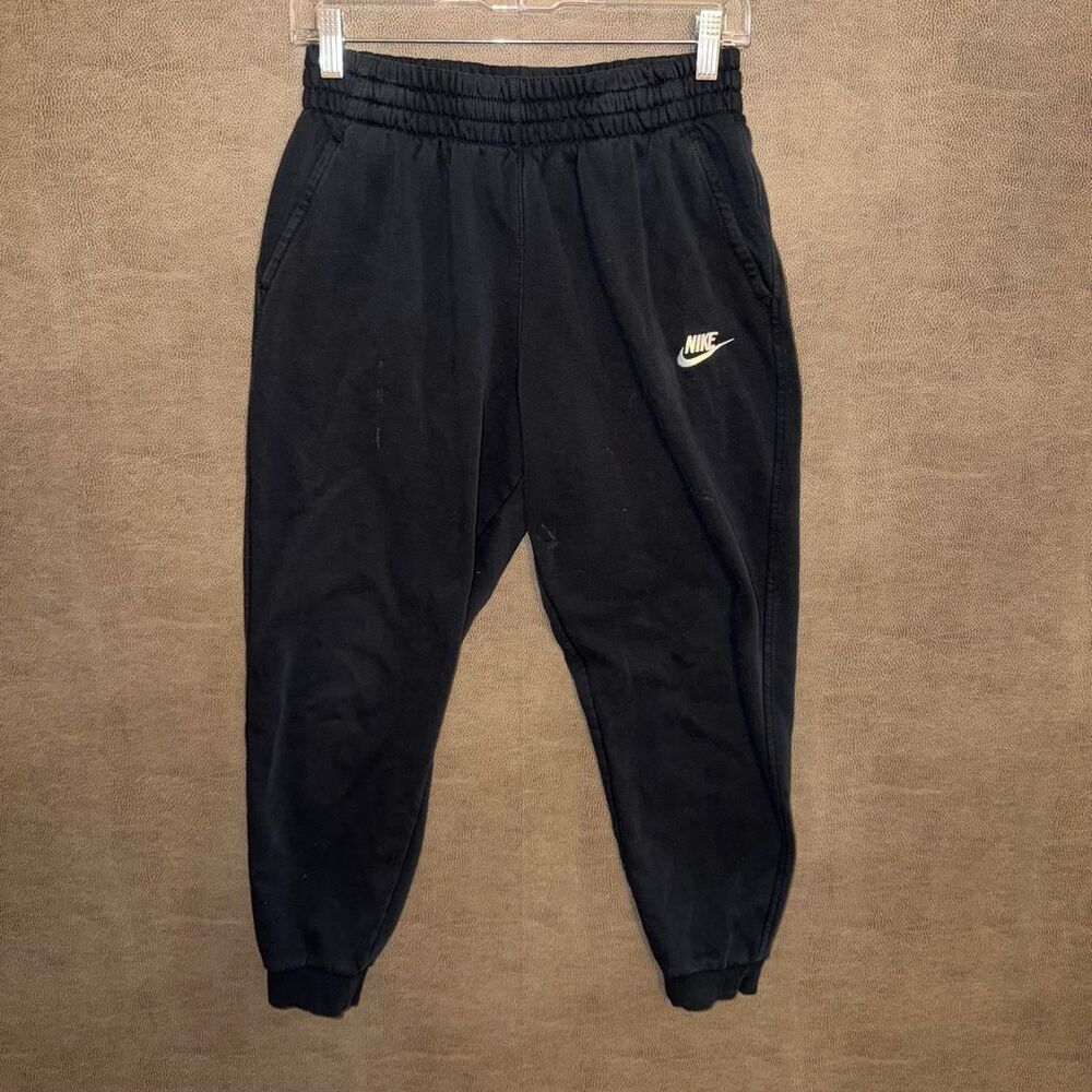 Black Nike joggers with white logo, size women’s XL